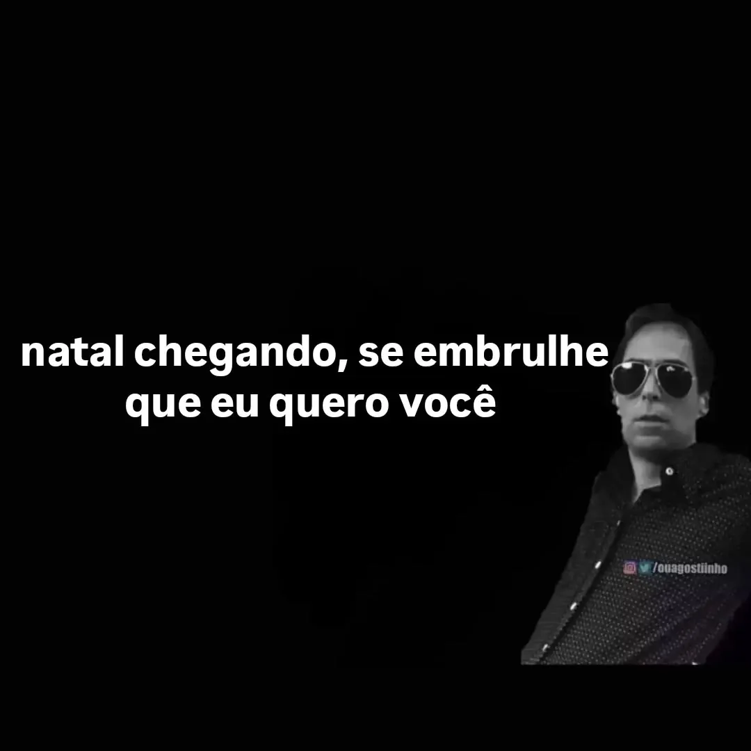meme de natal chegando com homem de óculos escuros e texto branco sobre fundo preto